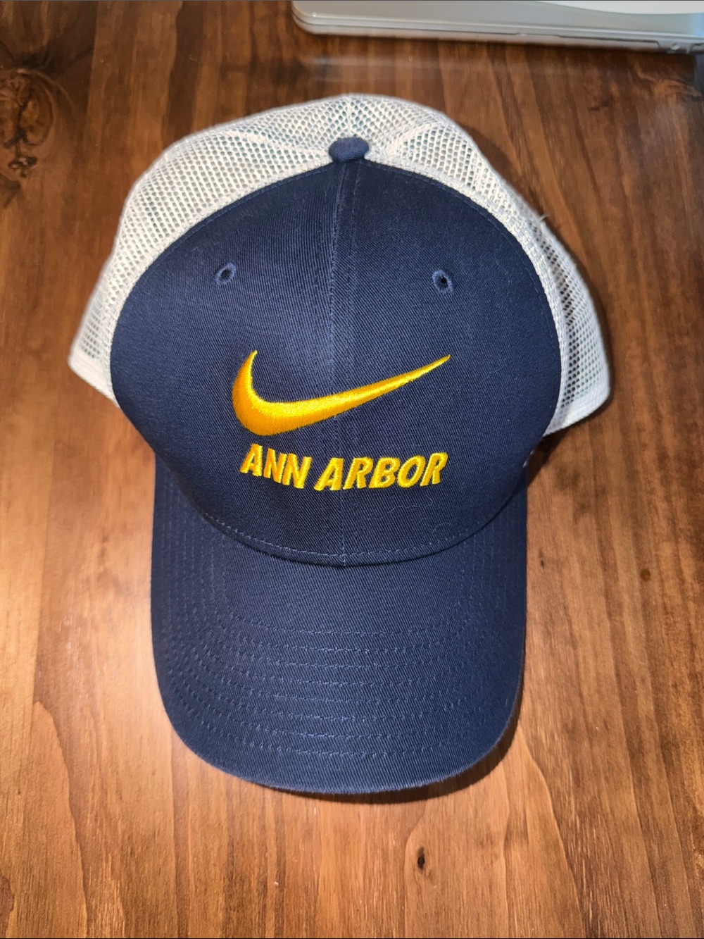Nike Navy and White Mesh Trucker Hat with Yellow Embroidered Swoosh